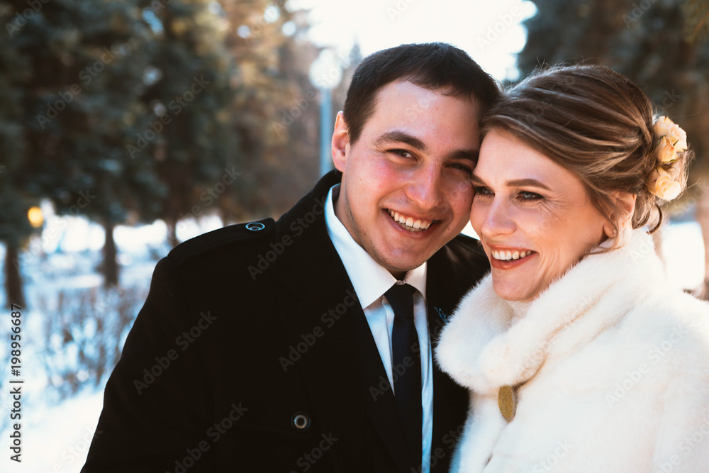 Winter bright wedding bride and groom couple Winter bright wedding bride and groom couple