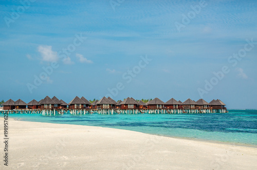 Over water bungalows on a tropical island  Maldives