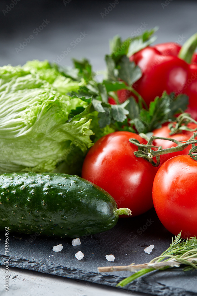 Delicious composition of assorted fresh vegetables and herbs on white textured background, top view, selective focus. Delicious composition of assorted fresh vegetables and herbs on white textured background, top view, selective focus.