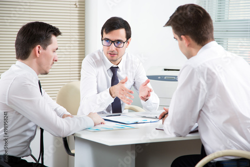 Businessmen working in an office