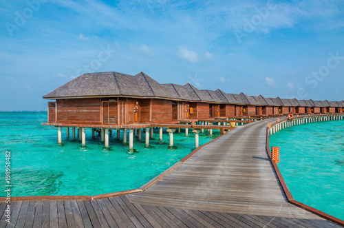 Over water bungalows on a tropical island, Maldives