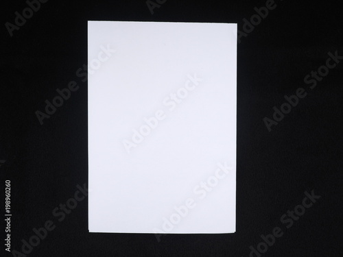 paper on a black background