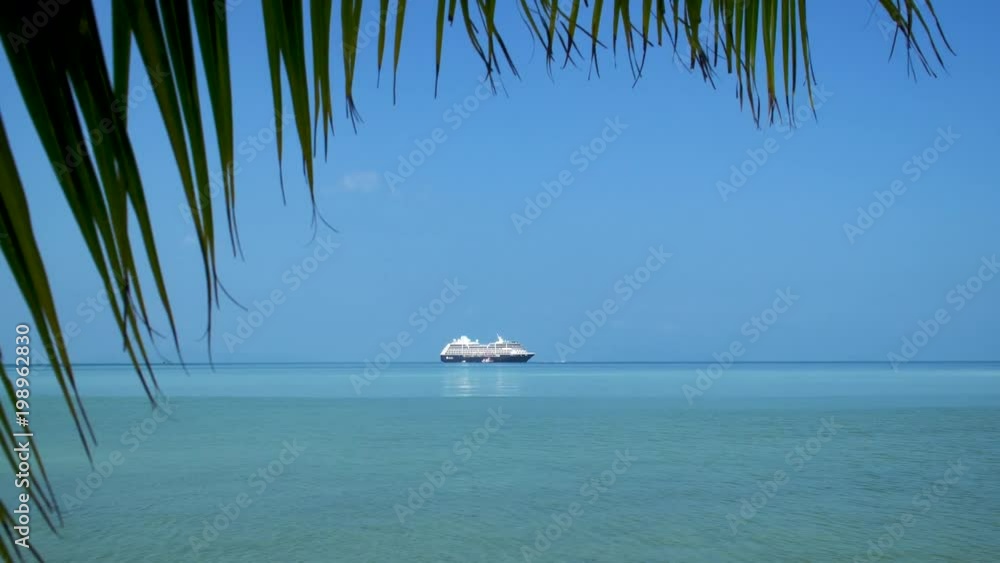 Cruise Ship Anchored in Tropical Bay