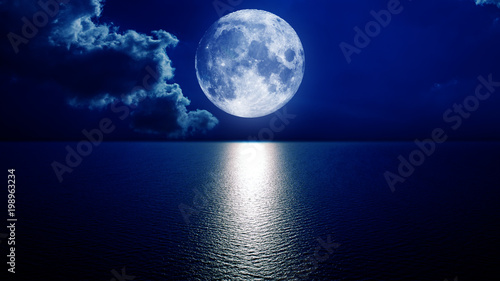 night sky with moon in the clouds  Elements of this image furnished by NASA