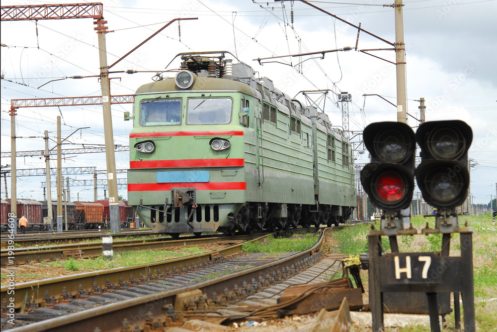 Fototapeta premium Semaphore and electric locomotive green