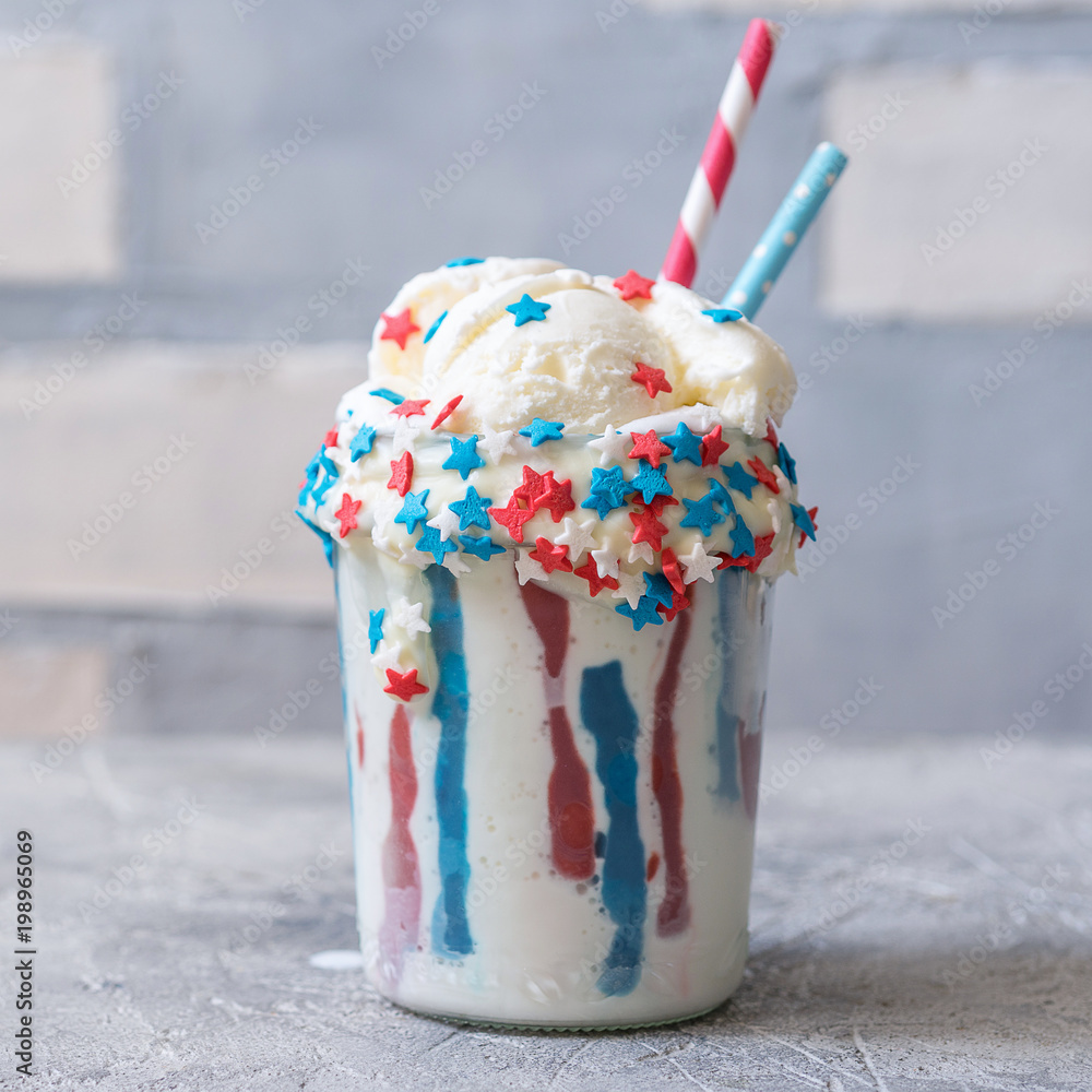 Obraz premium Vanilla funfetti milkshake with ice cream. Patriotic drink cocktail