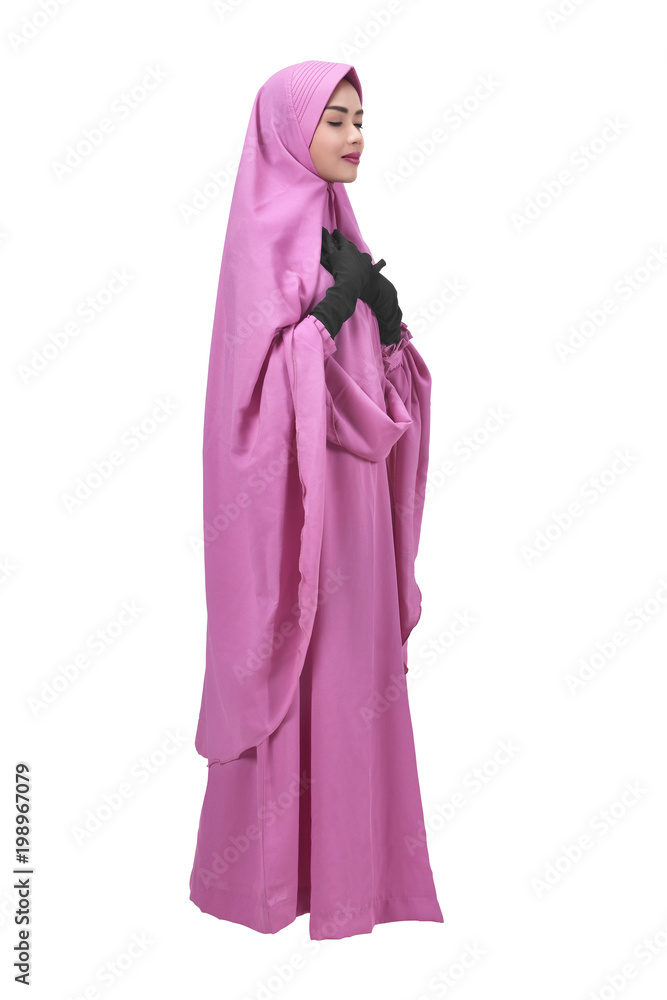 Beautiful asian muslim woman in veil praying Beautiful asian muslim woman in veil praying