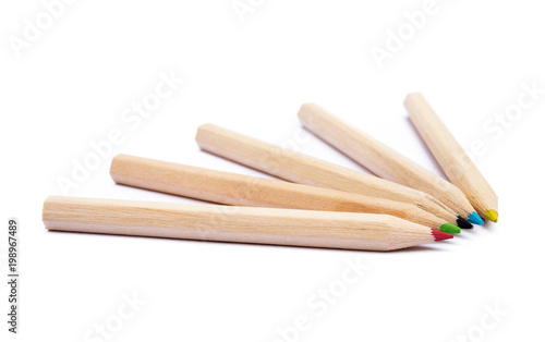 Wooden colorful ordinary pencils isolated on a white background 