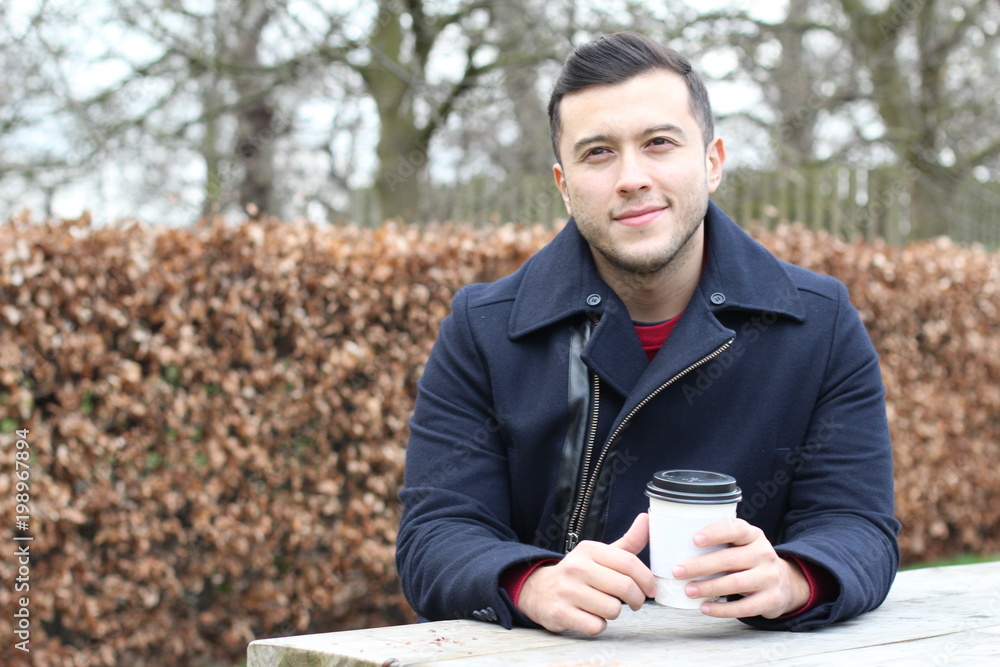 Ethnic businessman taking a coffee break Ethnic businessman taking a coffee break