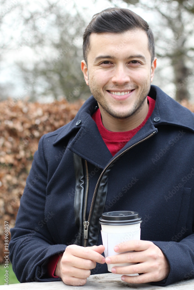 Ethnic businessman taking a coffee break Ethnic businessman taking a coffee break