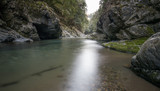 Calm pool surrounded by rocks on the Kiyotaki River