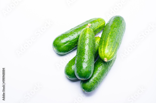 green cucumbers fresh on a white background