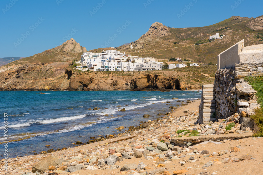 Traditional Greek houses situated on the hill in Naxos town. Cyclades, Greece. Traditional Greek houses situated on the hill in Naxos town. Cyclades, Greece.