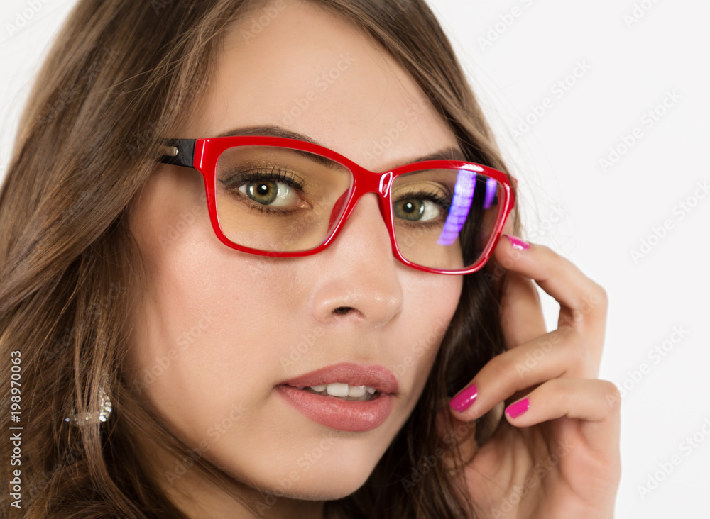 close-up sexy cute businessgirl in red glasses. fashion and make-up, beauty in business close-up sexy cute businessgirl in red glasses. fashion and make-up, beauty in business