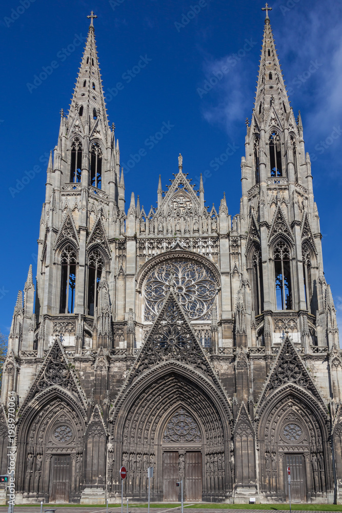 Remarkable gothic Notre Dame Cathedral in Rouen on blue sky background, Normandy, France