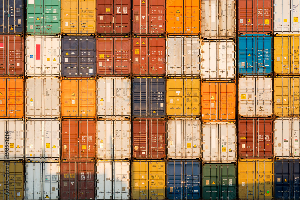 frontal view of a Stack of containers - obrazy, fototapety, plakaty 