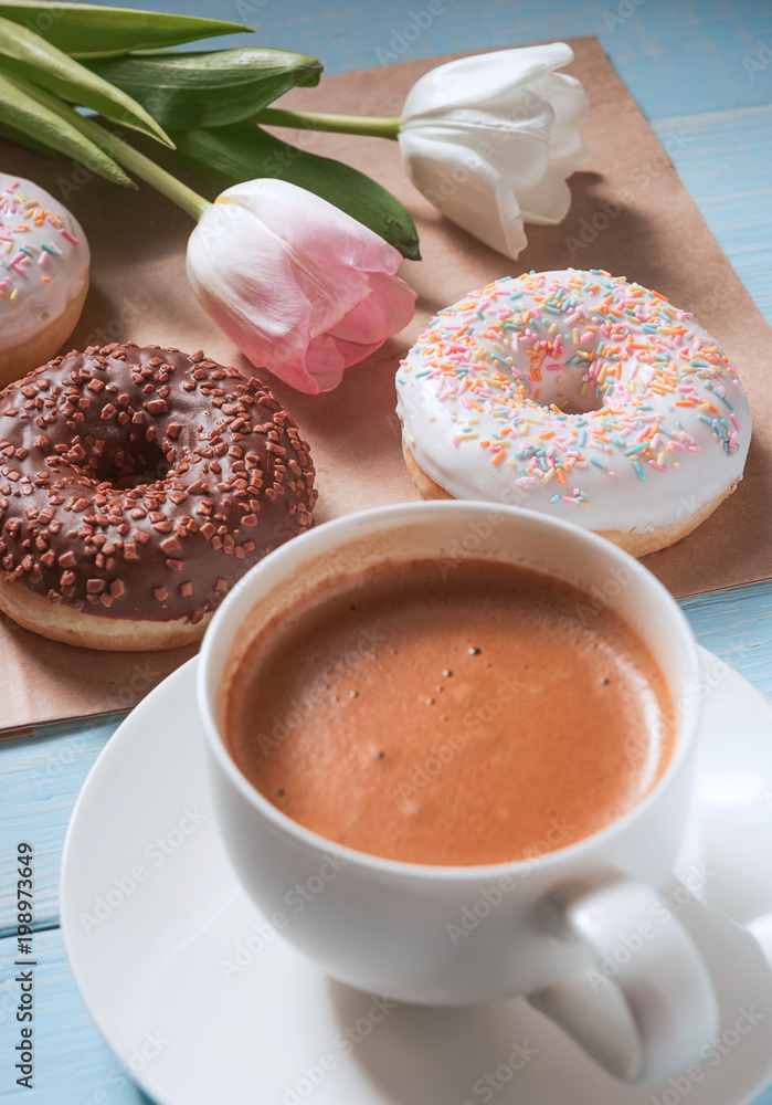 breakfast of donuts and coffee breakfast of donuts and coffee