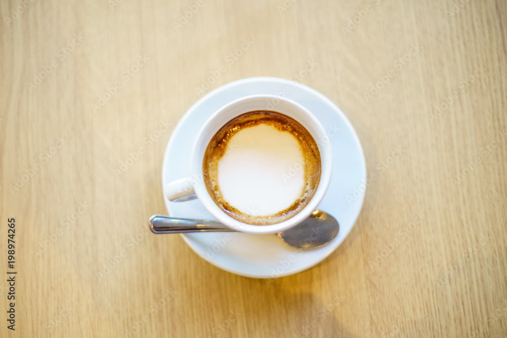 Americano Caffe with wooden background Americano Caffe with wooden background