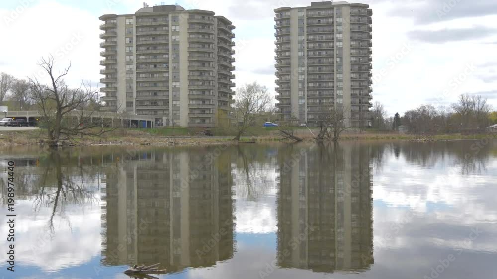 Buildings reflecting in the river Buildings reflecting in the river