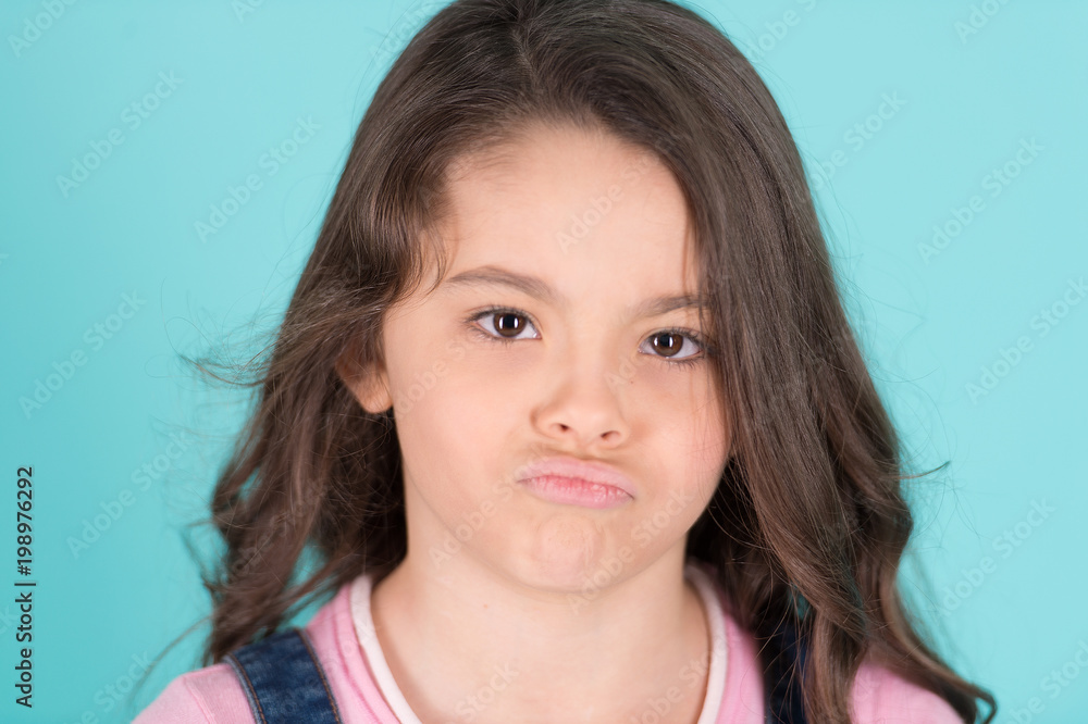 Beautiful girl looking sad with pouted lips Beautiful girl looking sad with pouted lips