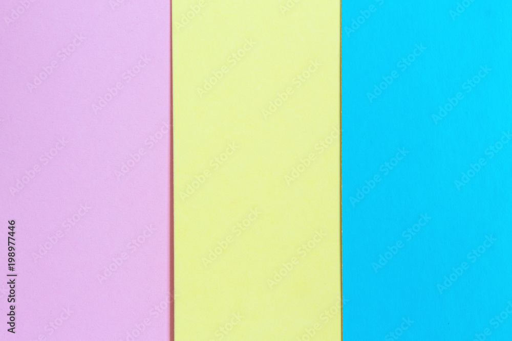 Multicolored blue, yellow, pink paper background
