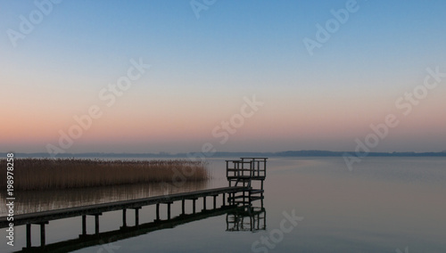Panorama, footbridge, and quiet scene on the lake in the north, Germany