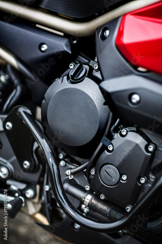 Motorcycle engine close-up detail background. © sichkarenko_com
