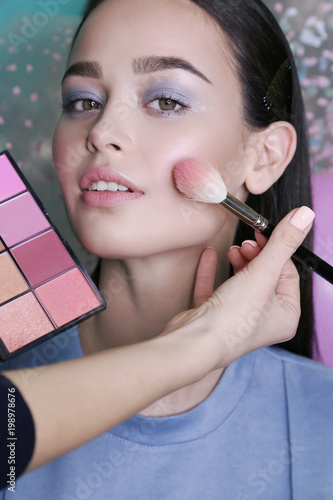 fashion photo of beautiful girl with bright makeup