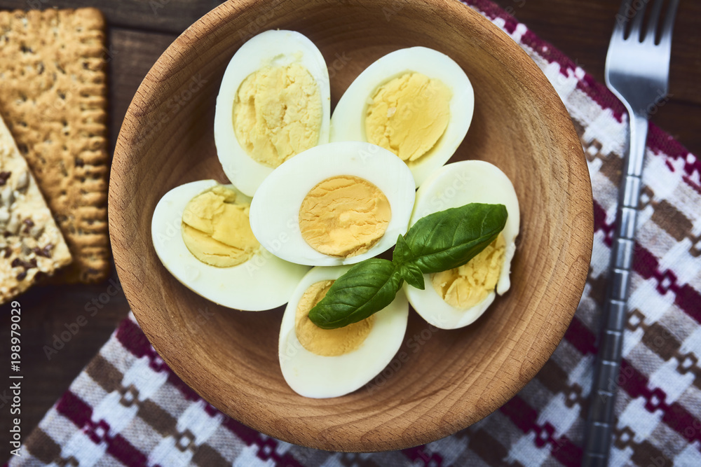 tasty boiled eggs over rustic background tasty boiled eggs over rustic background