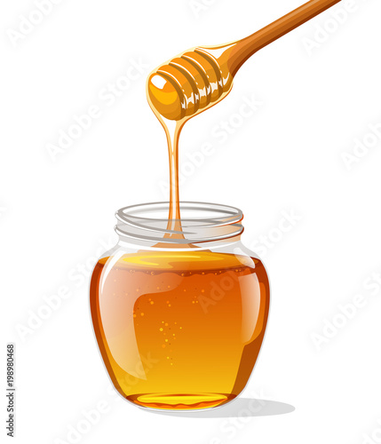 Glass jar of honey with wooden spoon 