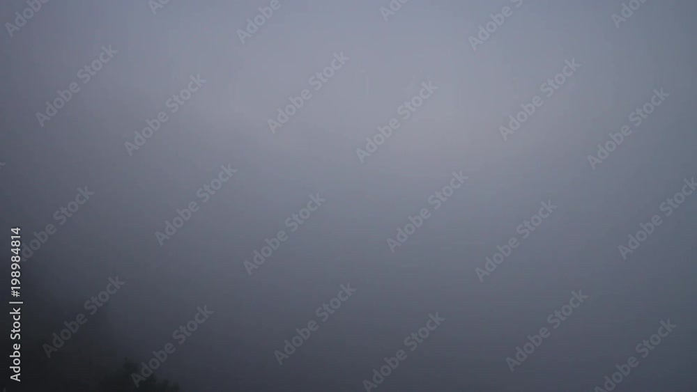 Time lapse - Fog over the city. Slowly dissolving in the morning. Mystical moment. Florianópolis, Santa Catarina / Brazil Time lapse - Fog over the city. Slowly dissolving in the morning. Mystical moment. Florianópolis, Santa Catarina / Brazil
