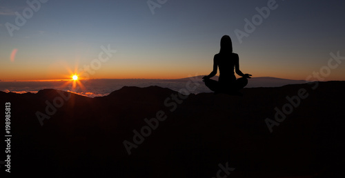 Yoga practicioner during the sunset meditation