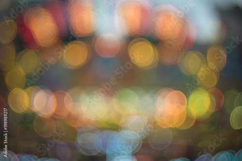 Blurred fairy lights, abstract texture of glowing lights - Christmas background texture, glitter sparkle - Colorful bokeh background, circles