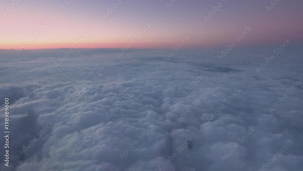 Looking out of airplane window at the sky Looking out of airplane window at the sky