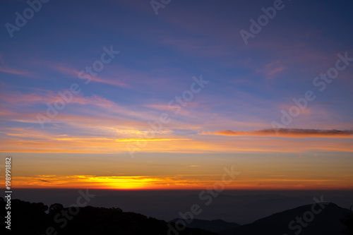 Morning atmosphere with sunrise view on the moutain of thailand. © Teerawut