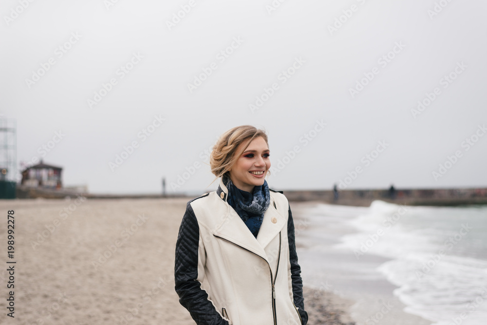 the girl on the beach saw something and smiled the girl on the beach saw something and smiled