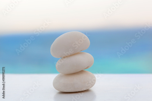 Bilde på lerret Rock cairn on tropical beach.