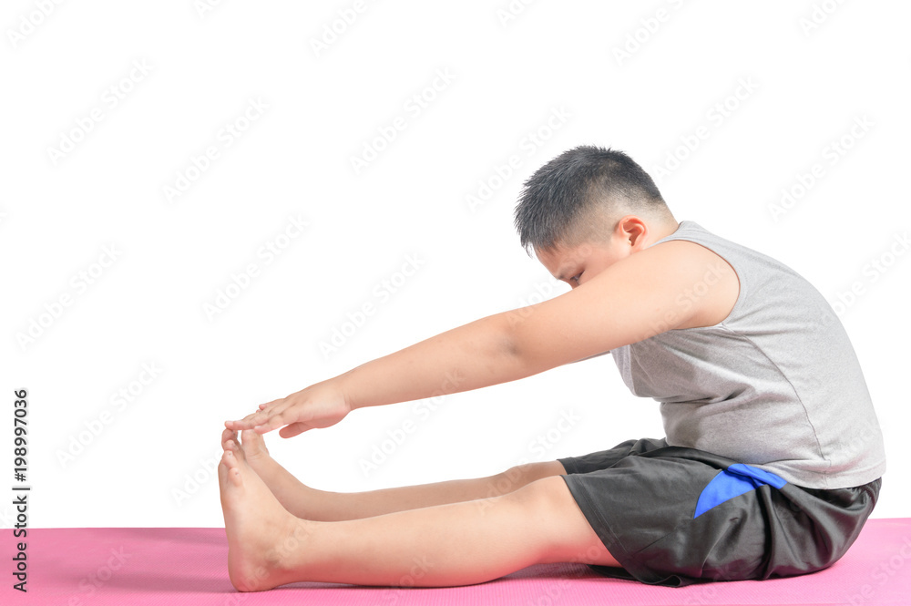boy doing workout to lose weight on yoga mat isolated boy doing workout to lose weight on yoga mat isolated