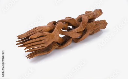 Wooden vase in the form of four bound hands