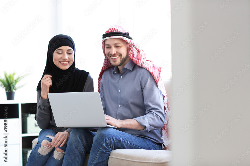 Muslim businessman with coworker in office Muslim businessman with coworker in office