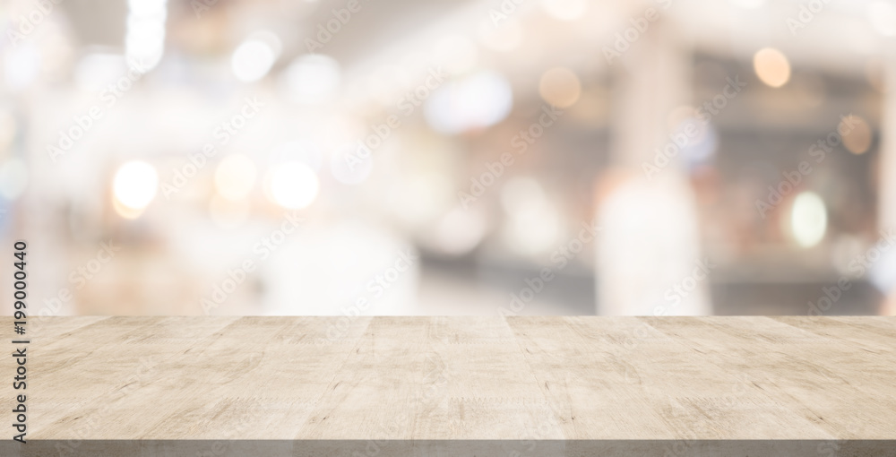 Wood table top on blurred background from shopping mall, Space for montage your products - obrazy, fototapety, plakaty 
