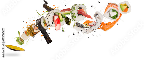Traditional japanese sushi pieces on rustic concrete background.