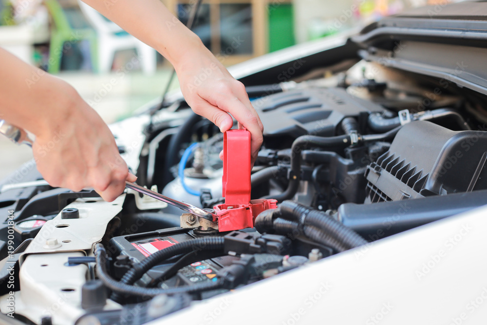 Auto mechanic working at outdoor. Repair service concept Auto mechanic working at outdoor. Repair service concept