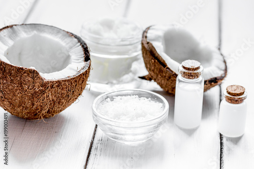 organic cosmetics concept with coconut on table background