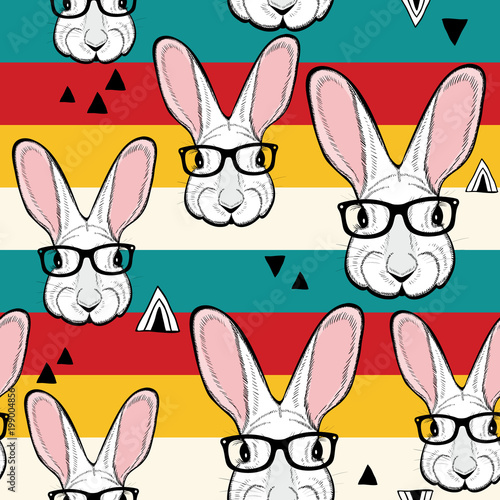 Seamless pattern with stripes and white rabbits in retro colors.