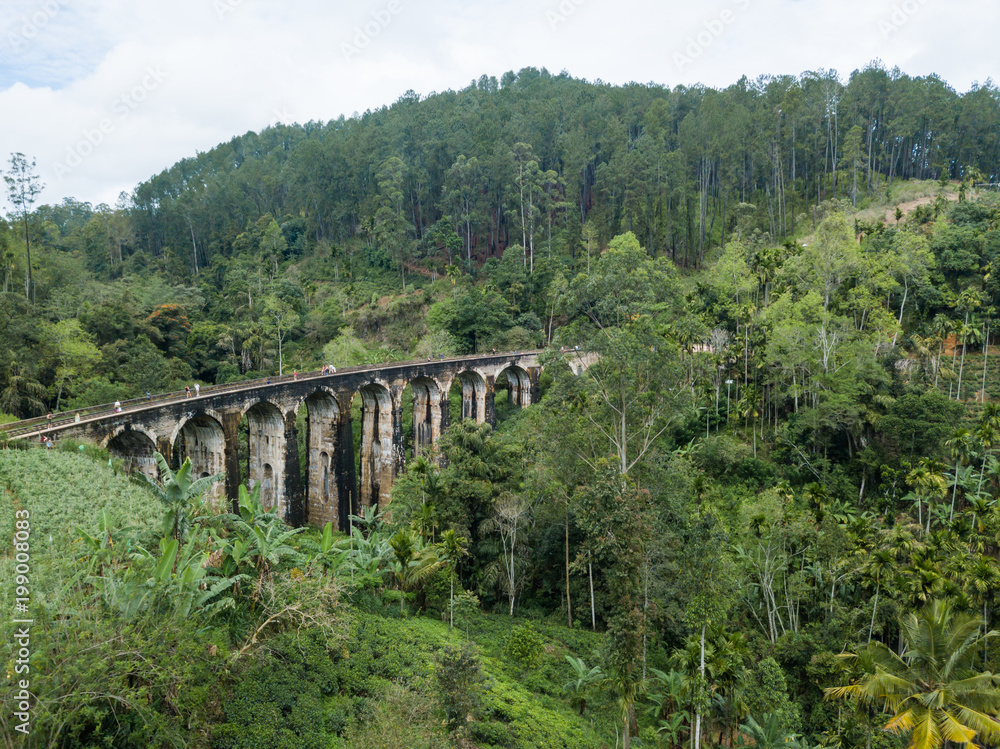 Old railway in the jungle. Aerial View. Nine Arches Bridge is located in Demodara, Ella city, Sri Lanka.
