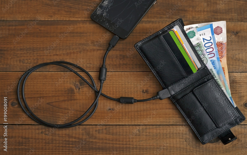 black leather wallet with banknotes and smartphone with broken screen black leather wallet with banknotes and smartphone with broken screen
