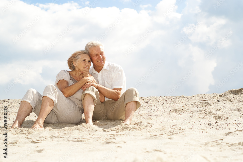 Beauteous elderly people enjoy the sea breeze Beauteous elderly people enjoy the sea breeze
