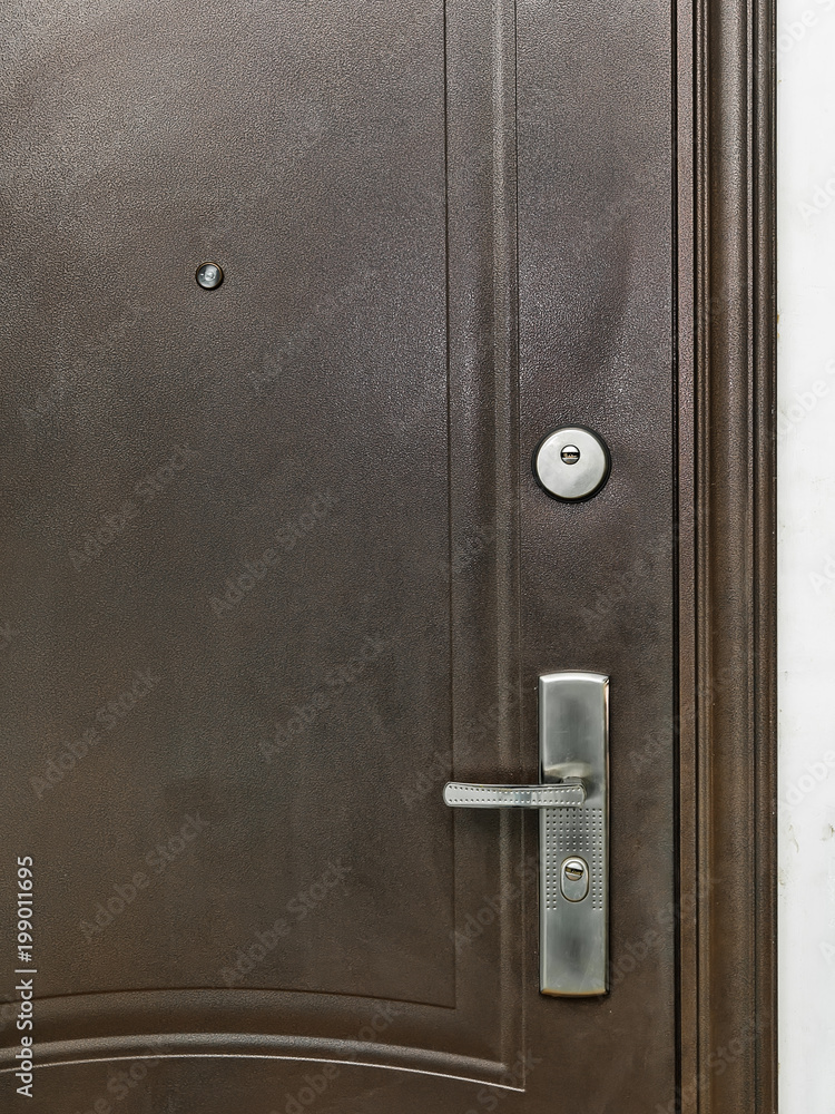 Obraz premium Abstract closed brown steel door photo close