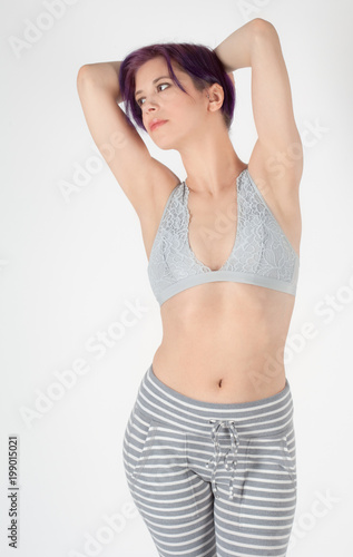 Woman in Lacy Bralette and Striped Leggings © mpaphotoftl